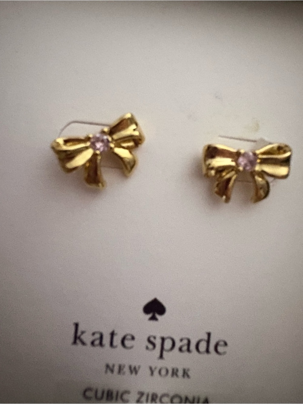 kate spade gold bow stud earrings with light pink center